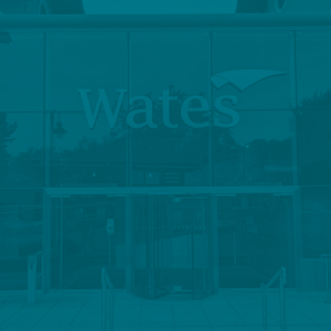 11 - Wates Logo - Background